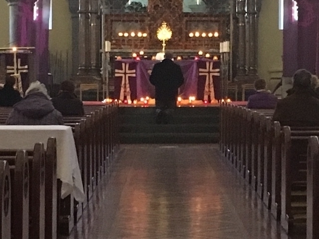24 Hours for the Lord - person praying in front of the altar